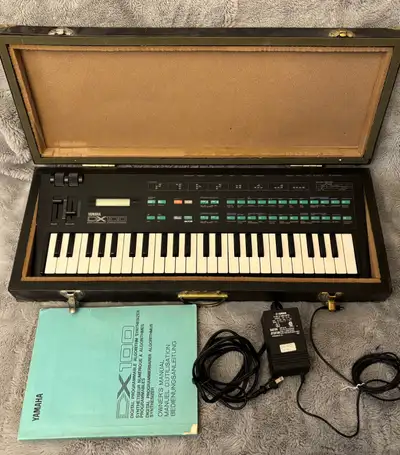 Yamaha DX100 Vintage Digital Programmable  FM Synthesizer & case, View more