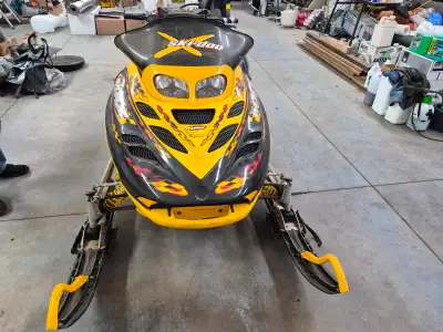 Truly a well preserved machine. 2002 skidoo mxz 700 twin. Liquid cooled , hand warmers Exellent cond...