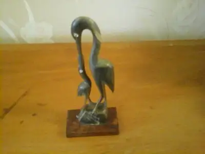 Hand Carved (Animal Horn) Crane Feeding a Baby., View more