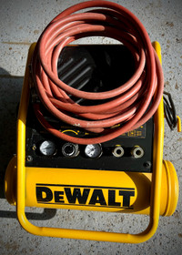 Dewalt small air compressor with hose  like new 