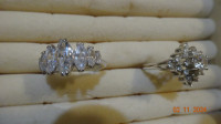 2 rings, lots  stones, not test for diamonds, cluster type,fabu