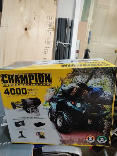 Champion 4000 lb power winch. Brand new in box never opened. $150 cash and pick up only.