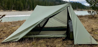 Non-freestanding single wall dual entry silpoly tent. 2 vestibules. Offset ( trecking ) pole design....