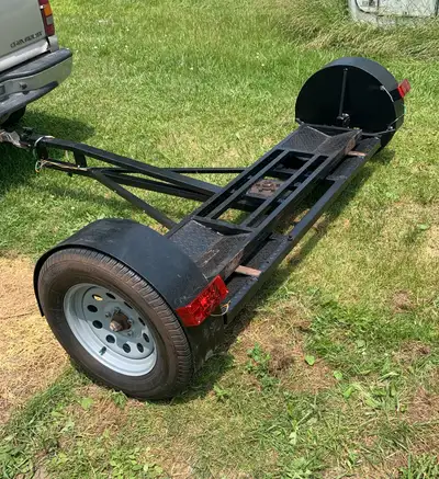 This Tow Dolly is designed for safely and efficiently towing vehicles; it is in used condition and r...