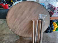 Round wood kitchen table.