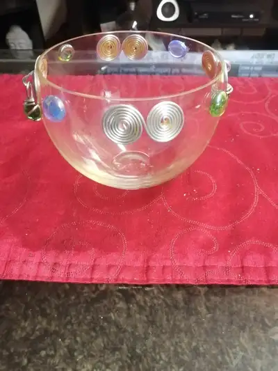 Glass bowl and vase $4 each, View more