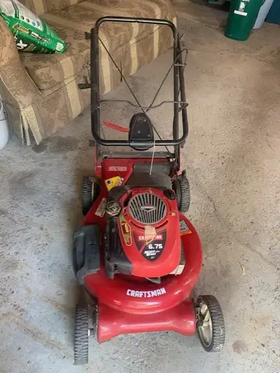 Self propelled. Rear gear drive. Briggs and Sstratton Gas Engine. 6.75 hp. 21 inch. Cash only. Price...