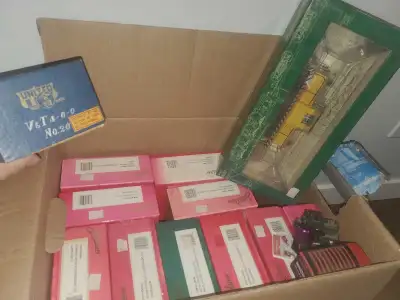 Explore this model train collection, featuring a variety of Spectrum and United engines and parts in...