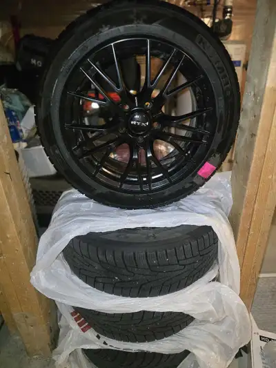 Up for grabs is a set of four RTX wheels wrapped in Kumho 225/50R17 winter tires. These tires have s...