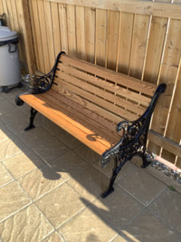 Solid oak and cast-iron park bench