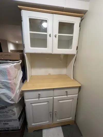China cabinet hutch in great condition. White with wood accent and bright chrome knobs/handles. $50...