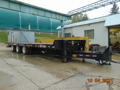 2018 BWS 30 ton 25' + 6' beaver tail ramp tilt deck trailer. Pneumatic brakes, tri-axle, this unit i...