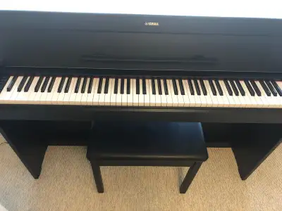 YAMAHA PIANO AND BENCH FOR SALE - NEW, View more