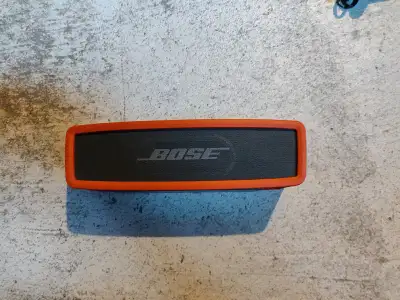 Absolutely in mint condition SoundLink mini Bluetooth speaker The rubber Case is from Boss and its w...