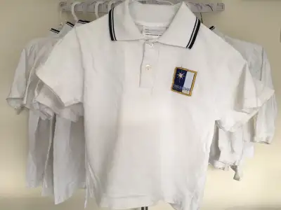 Previously used white collared shirts with Northstar Montessori patch. Decent condition. Some shirts...