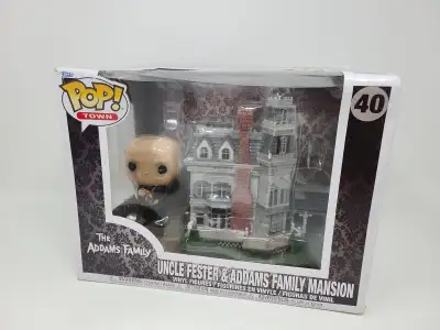 Selling a brand new Funko Pop The Addams Family Uncle Fester & Addams Family Mansion #40
