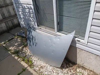 It has a few dents. Going for $200.