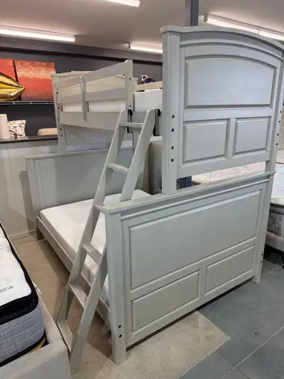 Twin over double bunkbed Complete with mattresses • Constructed from Birch veneers with Rubberwood a...