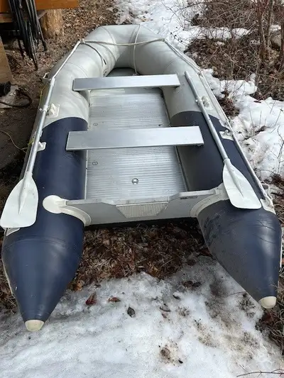 Inflatable boat with 9.9 HP merc outboard. Comes with 2 oars, lifejacket, airpump.