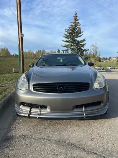 Light Grey Infiniti G35 coupe, with upgrades. V6 Automatic w/ transgo shift kit and paddle shifters,...