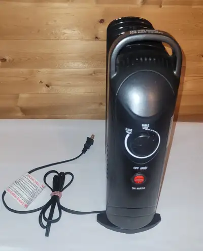 Mini oil heater 18 inch. Safe, cost effective. Great foe under desk or small room. $70.00 New Chilly...