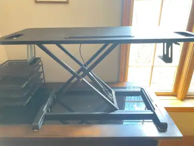 desk work station that raises for standing, View more