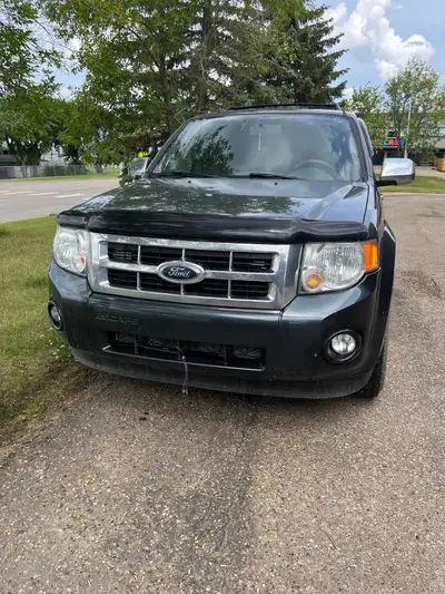 2009 ford escape has 250178 kilometres. Tires are in great shape they are a bit loud as as they are...