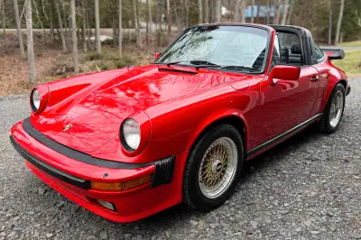 Up for auction is this 1982 Porsche 911 SC, a U.S.-spec example finished in Guards Red over black le...