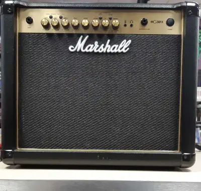 Marshall MG30FX 4-channel amplifier in good working condition We are located at 199 Wentworth St W....