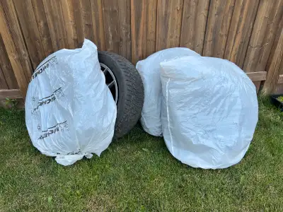 235/55R19 105T Used but good as new 19 inch winter tires (one flat tire). $399/4 tires