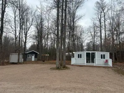 This new Tiny Home is situated on leased land in Mchigeeng on lake Mindemoya It is $1500 a year for...