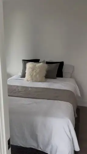 A beautiful master bedroom in a new high end condominium building, in the heart of downtown Toronto,...