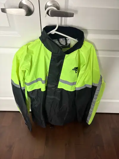 Nelson-Rigg two piece motorcycle rainsuit. Men’s large. Black and fluorescent green. Has reflective...