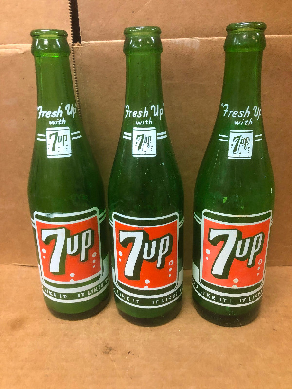 3 Vintage 7-UP Soda Pop Bottles in Arts & Collectibles in Regina