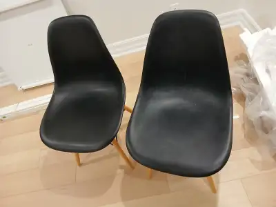 Two Black Eames Chairs., View more