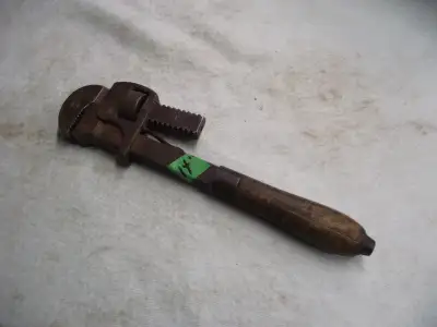 VINTAGE WOODEN HANDLE PIPE WRENCH, View more