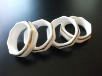 Royal Sandford Gold trimmed napkin rings, set of 4