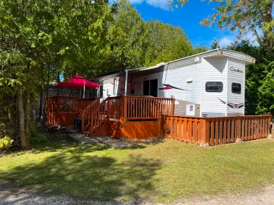 PRICED TO SELL AT $33K! This is a beautiful 2 bedroom park model trailer that can sleep up to 9 peop...