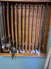  Violin bows and cases 