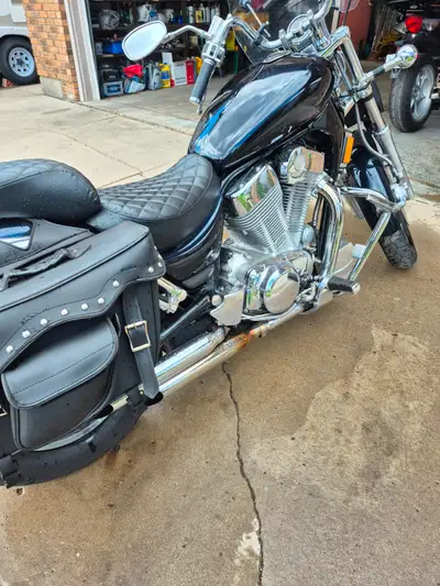 Good solid 1400 cc vtwin cruiser. Comfortable and incudes an aux fuel tank as the reservoir. New fro...