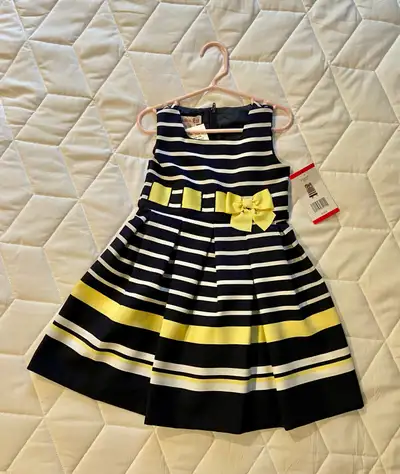 Brand new with tags, girl’s dress. Size 4T. Smoke-free and pet-free home.