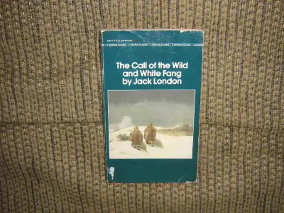 HEY FOR SALE IS A COPY OF WHITE FANG AND THE CALL OF THE WILD BY JACK LONDON. IT IS IN FAIR CONDITIO...