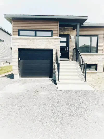 Be the First to Call This Beautiful Space Home! Discover this bright, modern, and newly built lower...