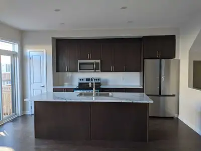 Welcome to 43 Teelin Circle — a bright and spacious 3-bedroom, 2.5-bath end-unit townhouse offering...