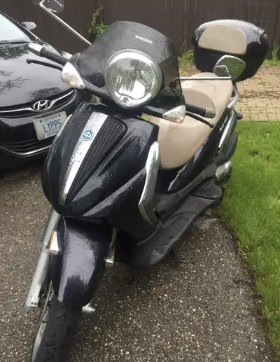 Selling my 2008 Piaggio BV 500 Luxury Touring Scooter, a sleek and stylish ride with only 4,354 kms...