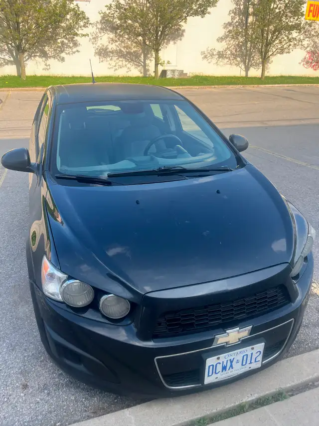 2014 Chevy Sonic base/ manual 5 speed $1000obo Or trade for ATV in Cars & Trucks in St. Catharines - Image 5