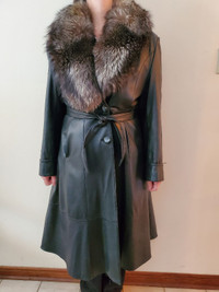 Elegant long leather coat with fur trim.