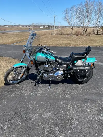 Would consider a trade with fishing boat. Dyna Wide Glide mint condition and comes with many extras....
