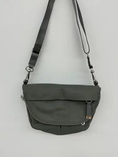 This Lululemon Festival Bag in Green. Is Lightly used and in excellent condition.There are no holes,...