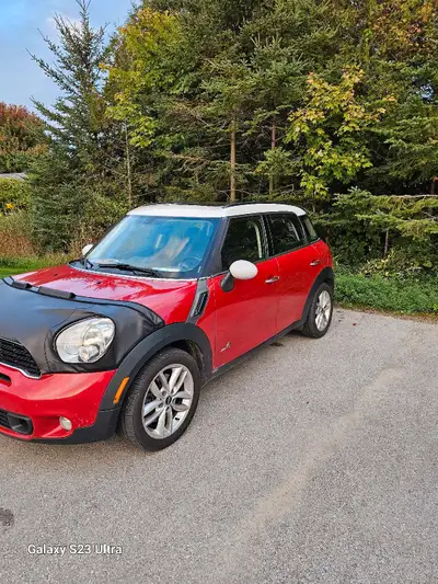 I'm selling my red Mini Cooper Countryman all wheel drive, a versatile and fun compact SUV. It's in...